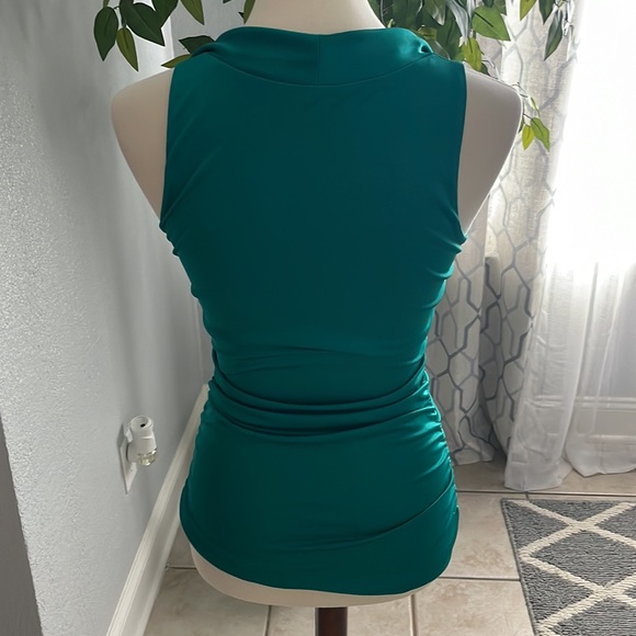 I brought this top to wear on Christmas Day only one day - Picture 2 of 5